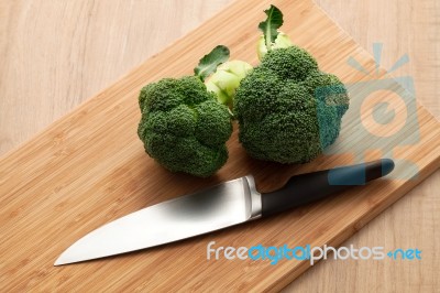 Broccoli On Wooden Board Stock Photo