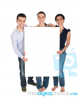 Brother And Sisters Holding Banner Stock Photo