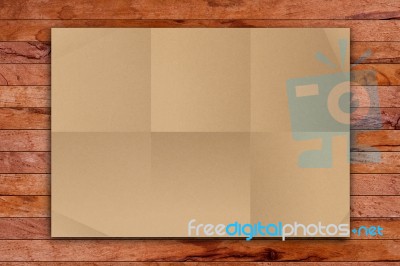 Brown Paper On Wood Stock Image
