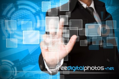 Business Hand Pushing The Virtual Button As Concept Stock Photo