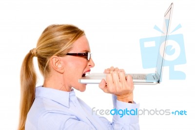 Business Lady Biting Laptop Stock Photo
