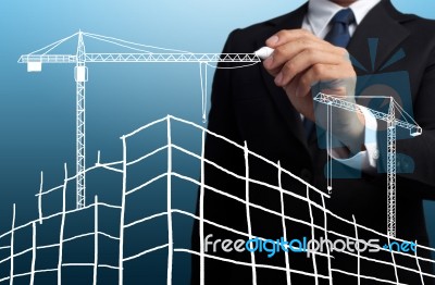 Business Man Drawing Construction Site Stock Photo