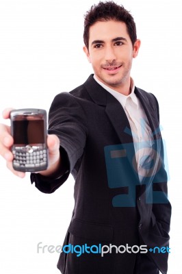 Business Man Showing A Mobile Phone Stock Photo