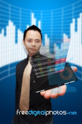 Business Man Showing Stock Graph Stock Photo