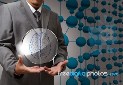 Business Man With Brain Button Stock Photo
