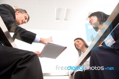 Business People At Meeting Stock Photo