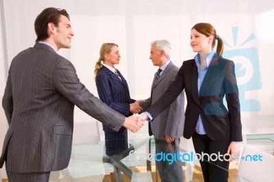 Business People Shaking Hands Stock Photo