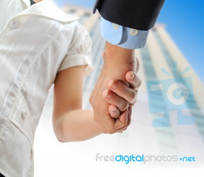 Business People Shaking Hands Stock Photo