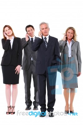 Business People With Phone Stock Photo