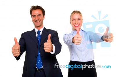 Business People With Thumbs Up Stock Photo