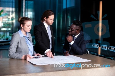 Business Team Working On A Project Stock Photo