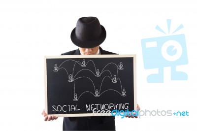 Businessman Holding A Sign Stock Photo