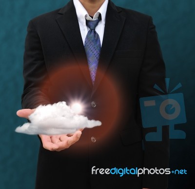 Businessman Holding Cloud Stock Photo
