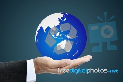 Businessman Holding Globe Stock Photo