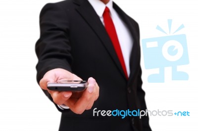 Businessman Holding Smart Phone Stock Photo