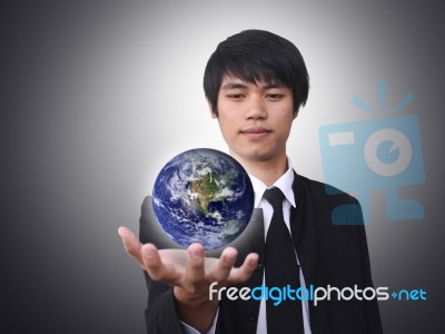 Businessman Holding World Stock Photo