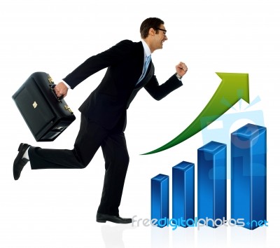 Businessman In Running Posture, Growth Concept Stock Photo