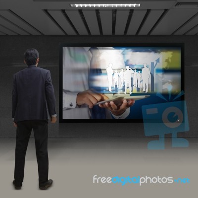 Businessman Looking At Tv Stock Photo