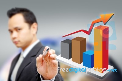 Businessman Pointing At Chart Stock Photo