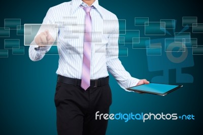 Businessman Pressing Touchscreen Stock Photo
