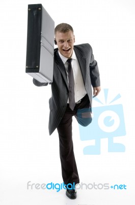 Businessman Running With Briefcase Stock Photo