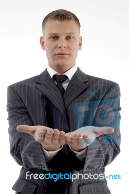 Businessman Showing Begging Gesture Stock Photo