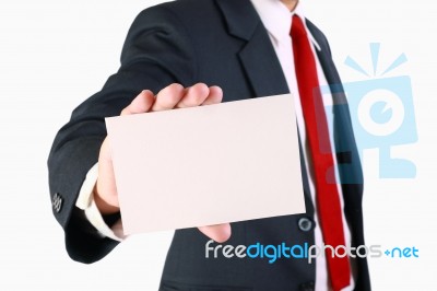 Businessman Showing White Card Stock Photo