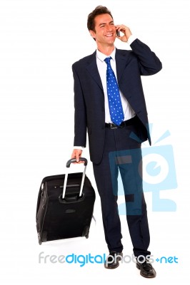 Businessman Talking Over Mobile Stock Photo