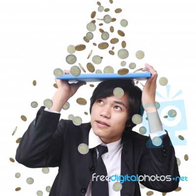 Businessman Under Money Rain Stock Photo