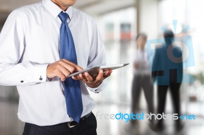 Businessman Using Tablet Stock Photo