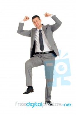 Businessman With Foot On Step Stock Photo