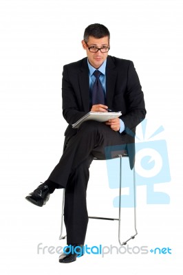 Businessman With Notebooks Stock Photo