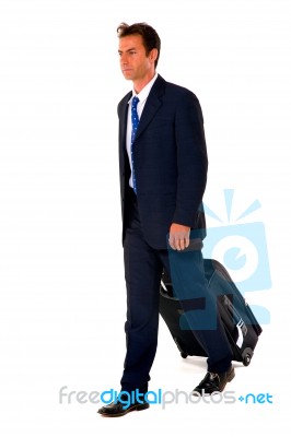 Businessman With Travel Bag Stock Photo