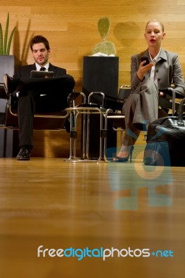 Businessperson Waiting In Lobby Stock Photo