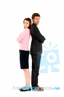 Businessperson With Back To Back Stock Photo