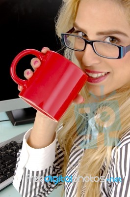 Businesswoman drinking coffee Stock Photo