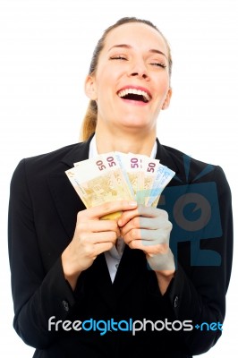 Businesswoman Holding Money Stock Photo