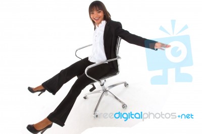 Businesswoman On A Chair Stock Photo