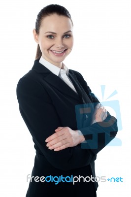 Businesswoman With Folded Arms Stock Photo