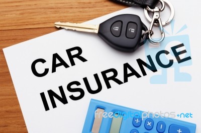 Car Insurance With Car Key Stock Photo