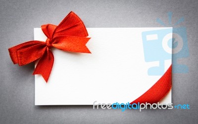 Card With Red Ribbons Bows Stock Photo