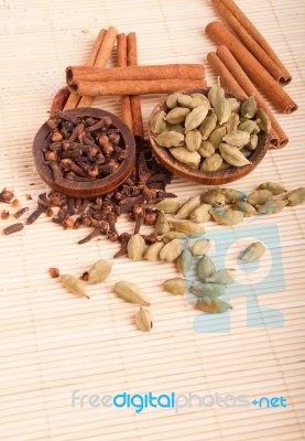 Cardamom Pods And Cloves Stock Photo