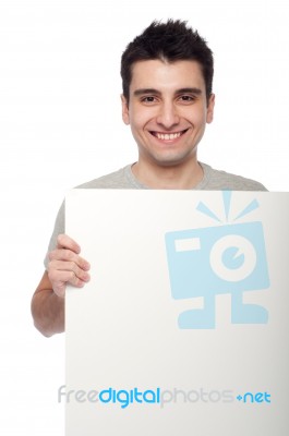 Casual Man With A Banner Stock Photo