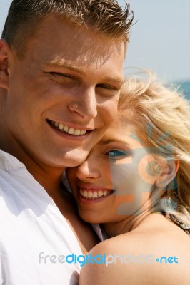 Caucasian Young Couple hugging Stock Photo