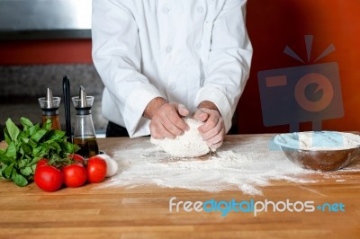 Chef Preparing Pizza Base, Cropped Image Stock Photo