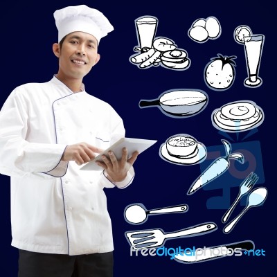 Chef Using Digital Tablet Stock Photo