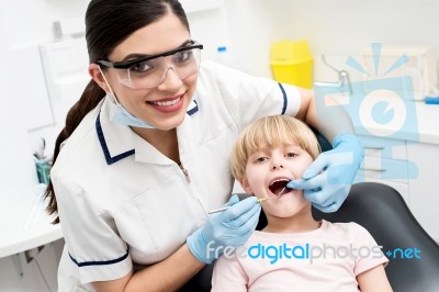 Child On Her Dental Check Up Stock Photo