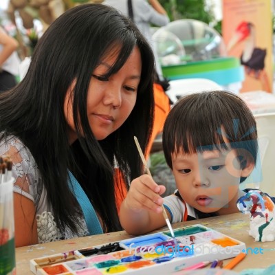 Child Painting Stock Photo