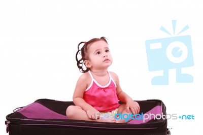 Child Sitting On Suitcase Stock Photo