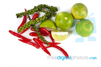 Chili Peppercorn And Lime Stock Photo